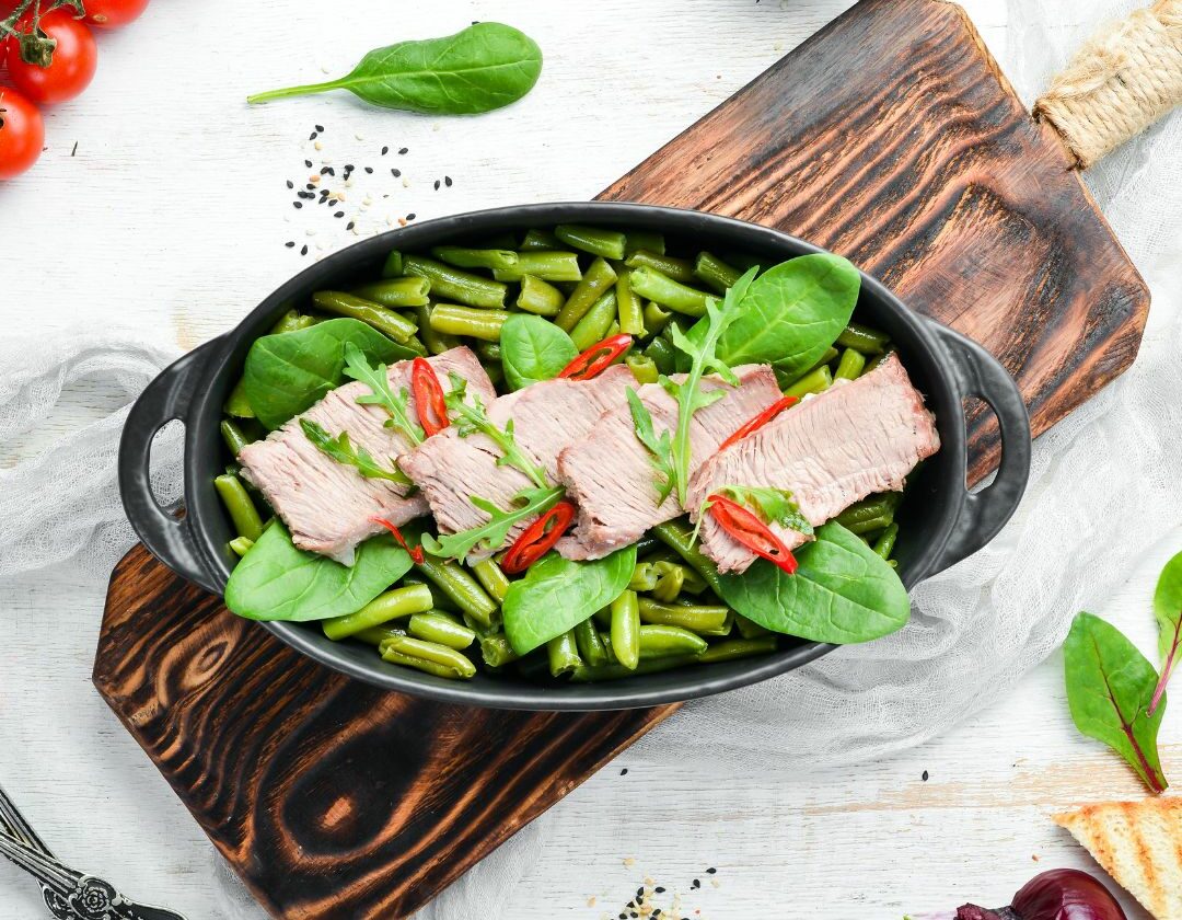 Dinde en tranche poêlée légumes verts